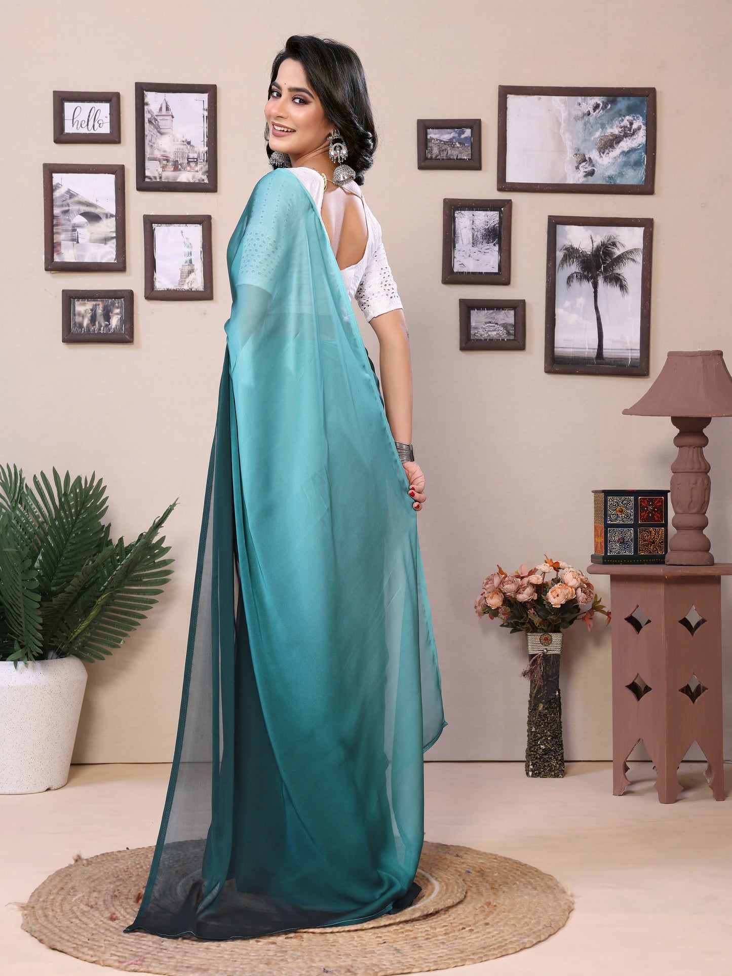Soft satin festive saree in teal color