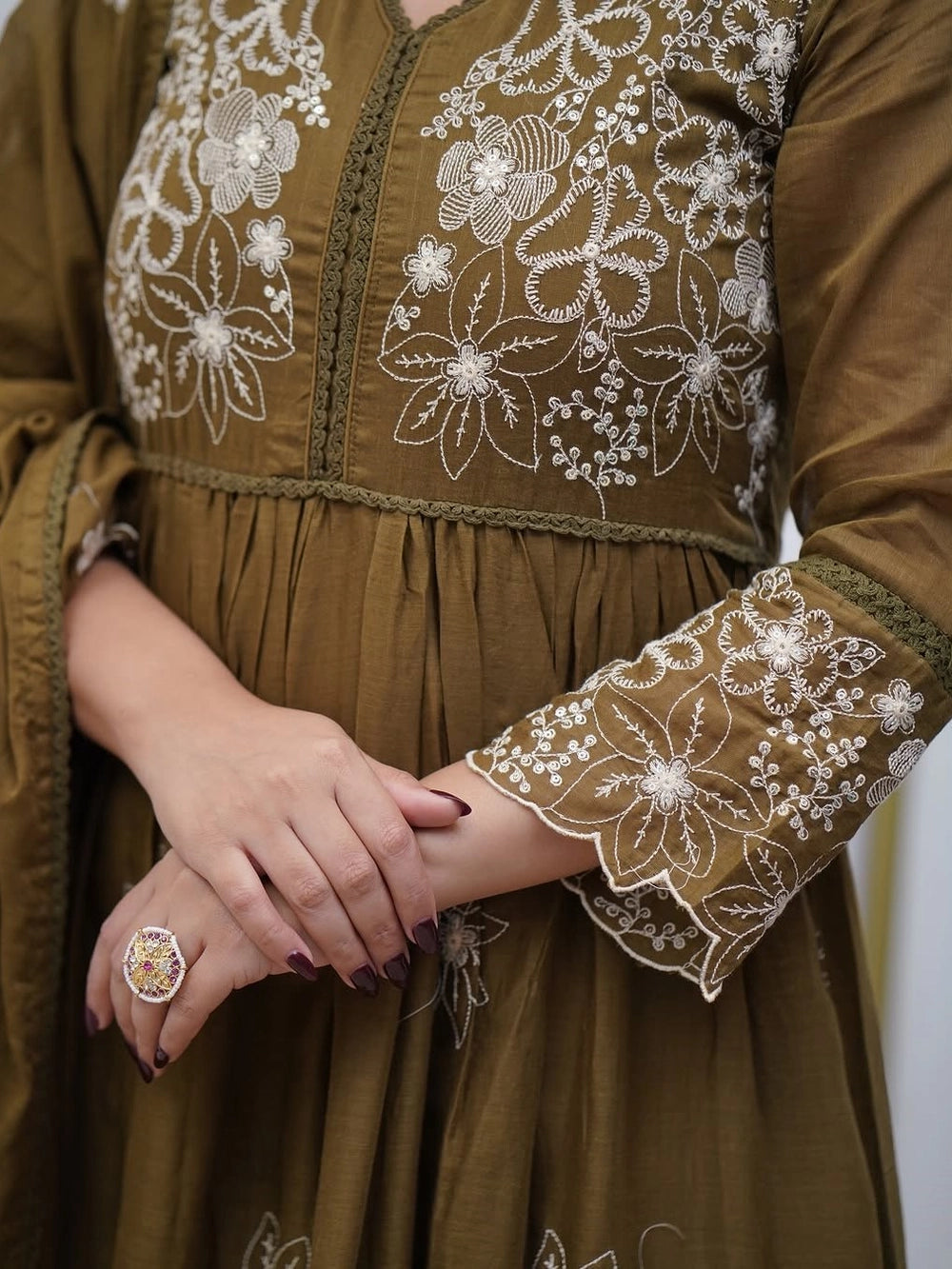 Olive ethnic Anarkali kurta set with dupatta and detailed embroidery