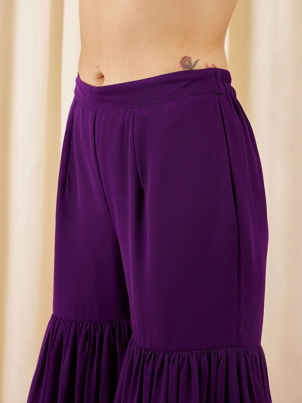 Trendy purple embroidered kurti with dupatta and matching palazzo
