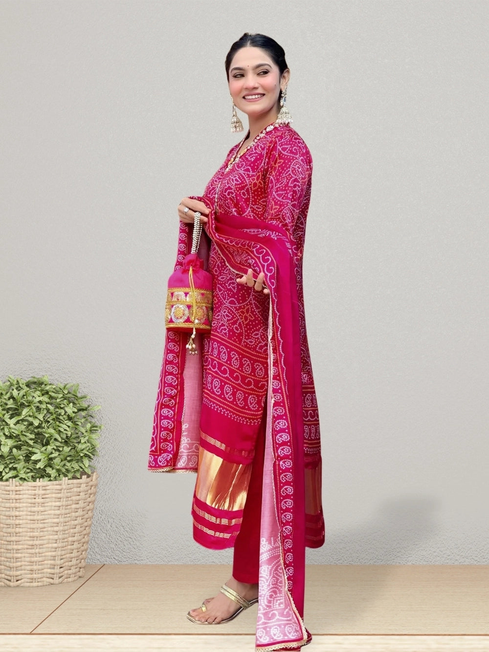 Rhey festive Bandhani print kurta set in red viscose silk fabric