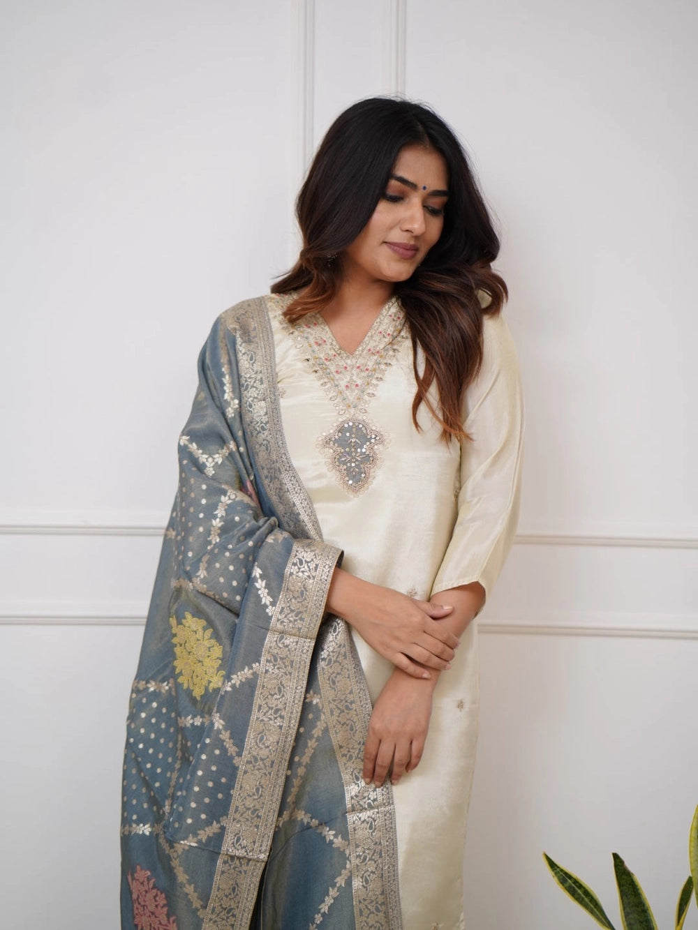 Stylish off-white kurta set with intricate embroidery and dupatta