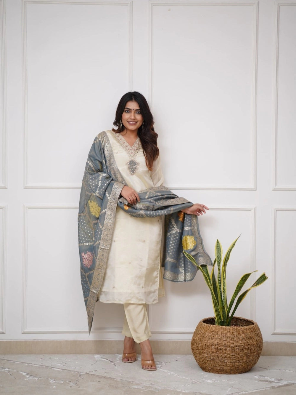 Off-white festive kurta set crafted in viscose with embroidery